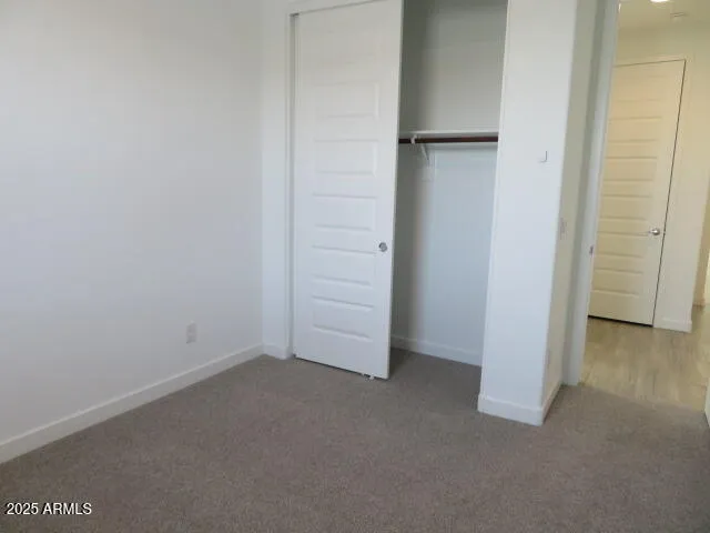 an empty room with closet