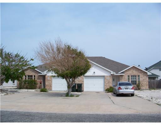 15430 Cruiser Street, Unit B Corpus Christi, TX 78418 - Photo 1 of 1 a house view with a outdoor space