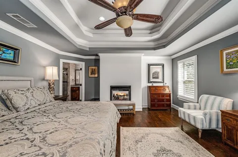 a bed room with a bed and a couch