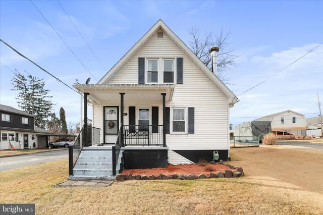 a view of a house with snow on the wall