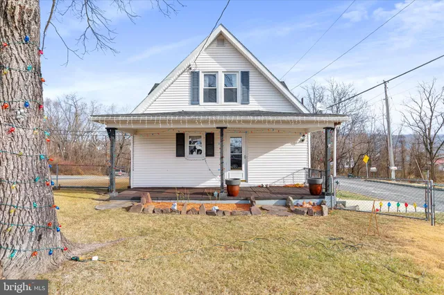 a front view of a house with patio