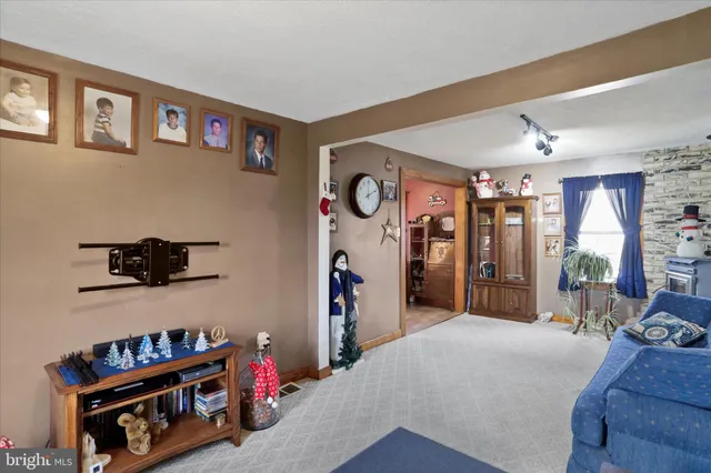 a bed room with a bed and a tv