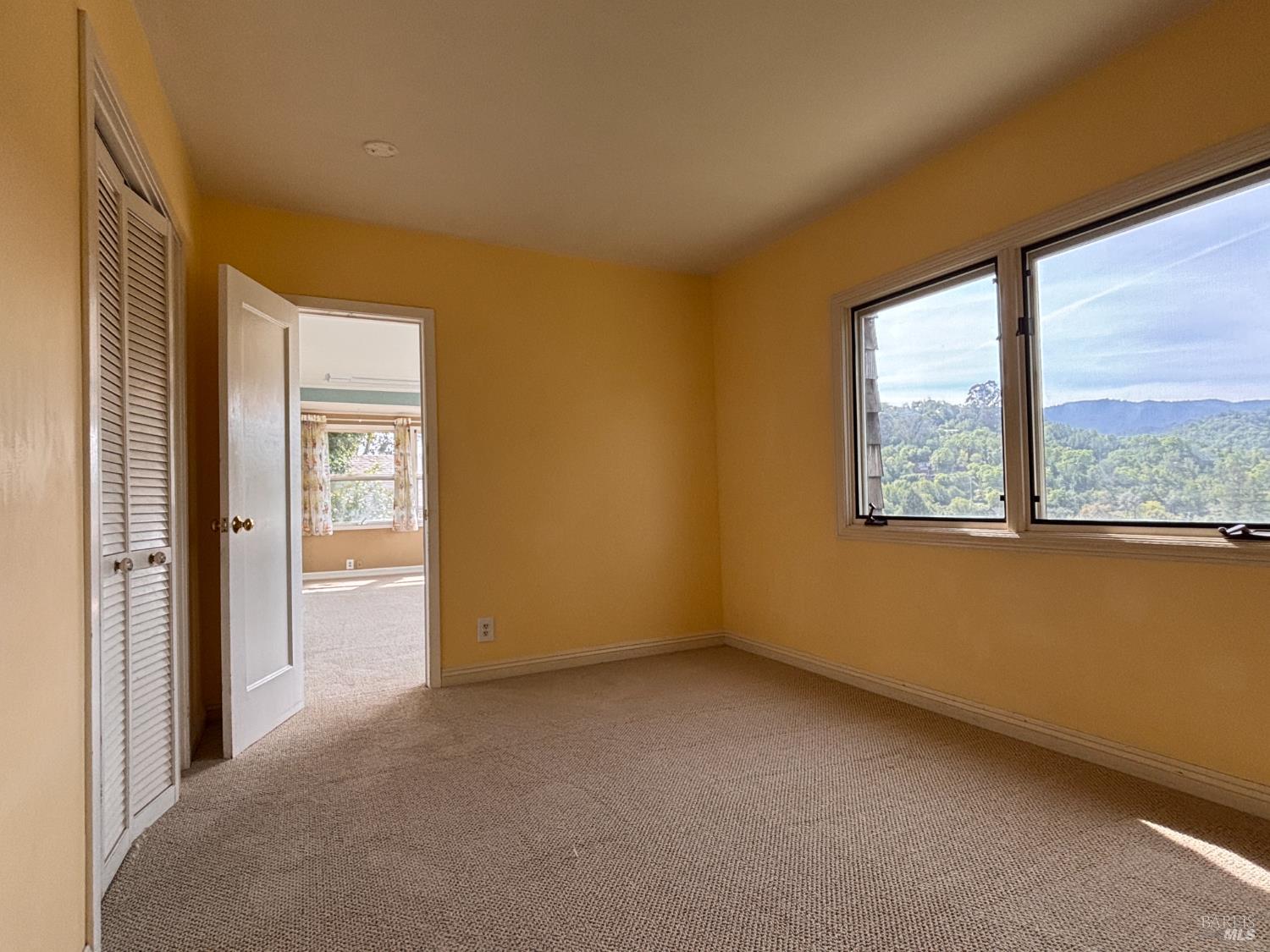 71 Rocca Drive Fairfax, CA 94930 - Photo 8 of 17 a view of an empty room with a window