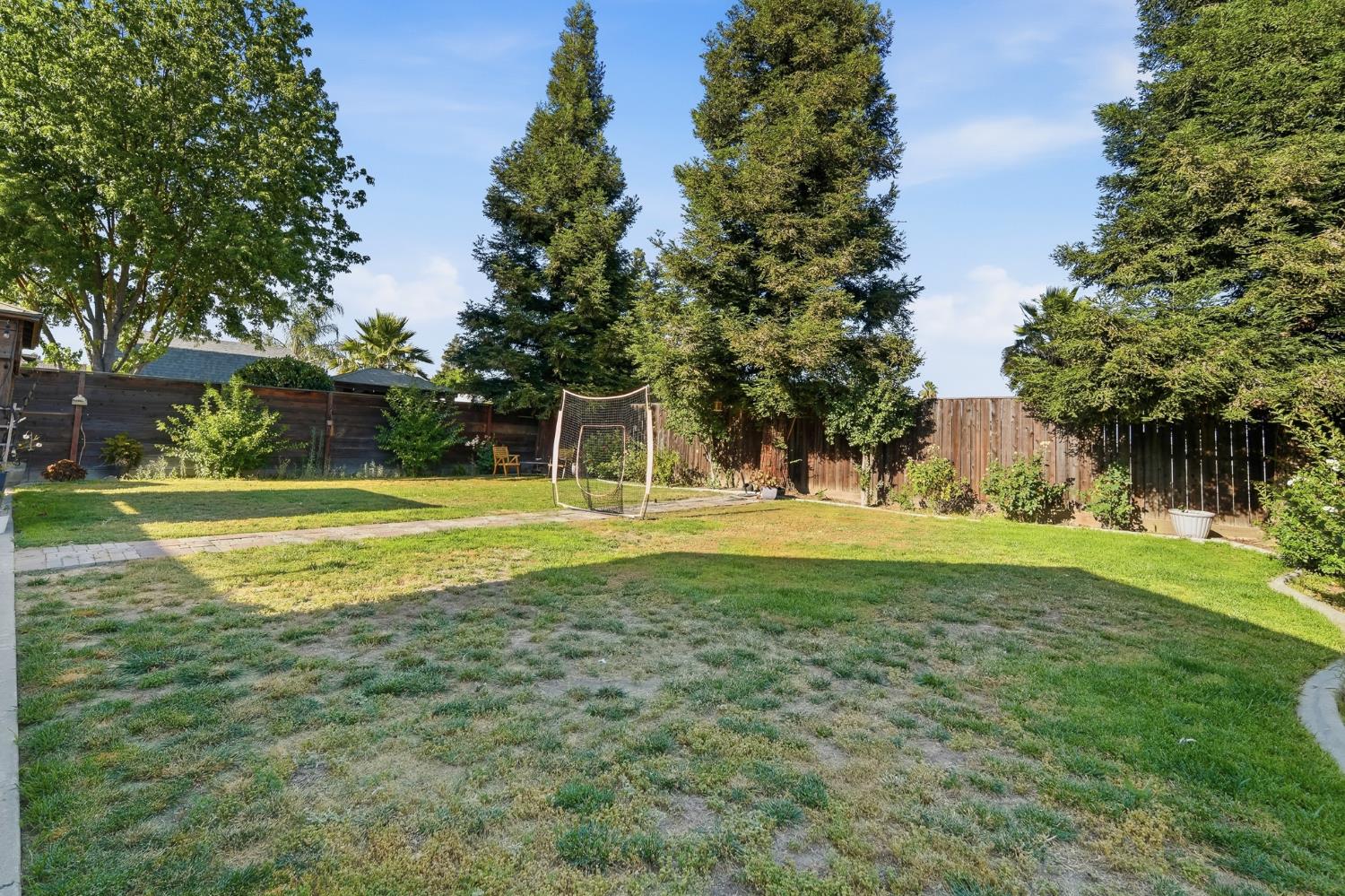 2220 Ellison Drive Modesto, CA 95355 - Photo 43 of 53 a view of a house with a big yard