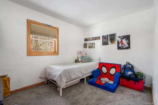 a bedroom with furniture and a bed