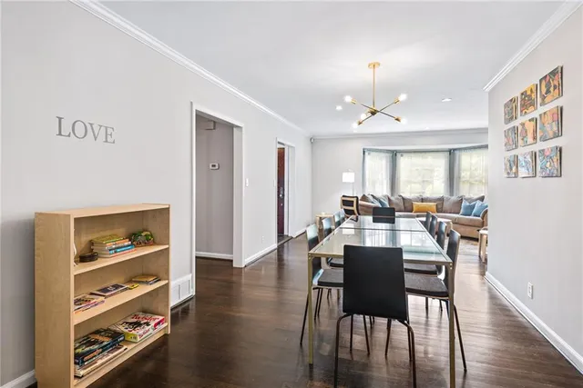 a kitchen with stainless steel appliances sink a microwave and cabinets