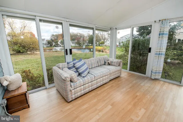 a view of livingroom with furniture and window