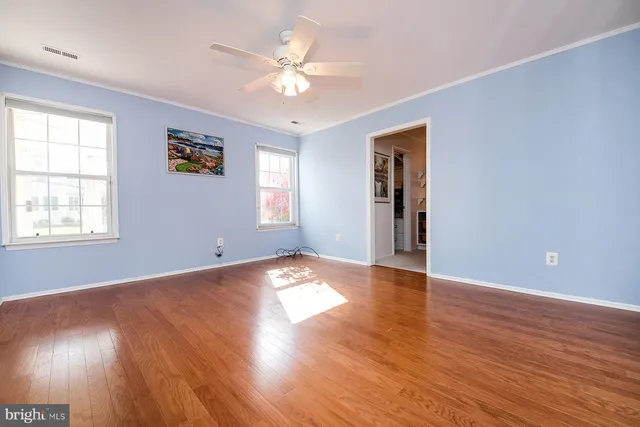 a view of a livingroom with wooden floor