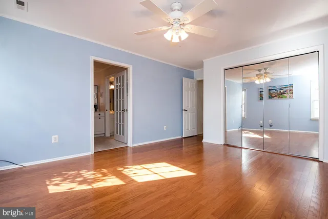 a bathroom with a sink vanity and mirror