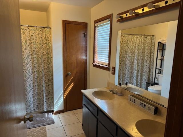 525 Middleton Loop Bolivar, TN 38008 - Photo 11 of 13 a bathroom with a granite countertop sink and a mirror
