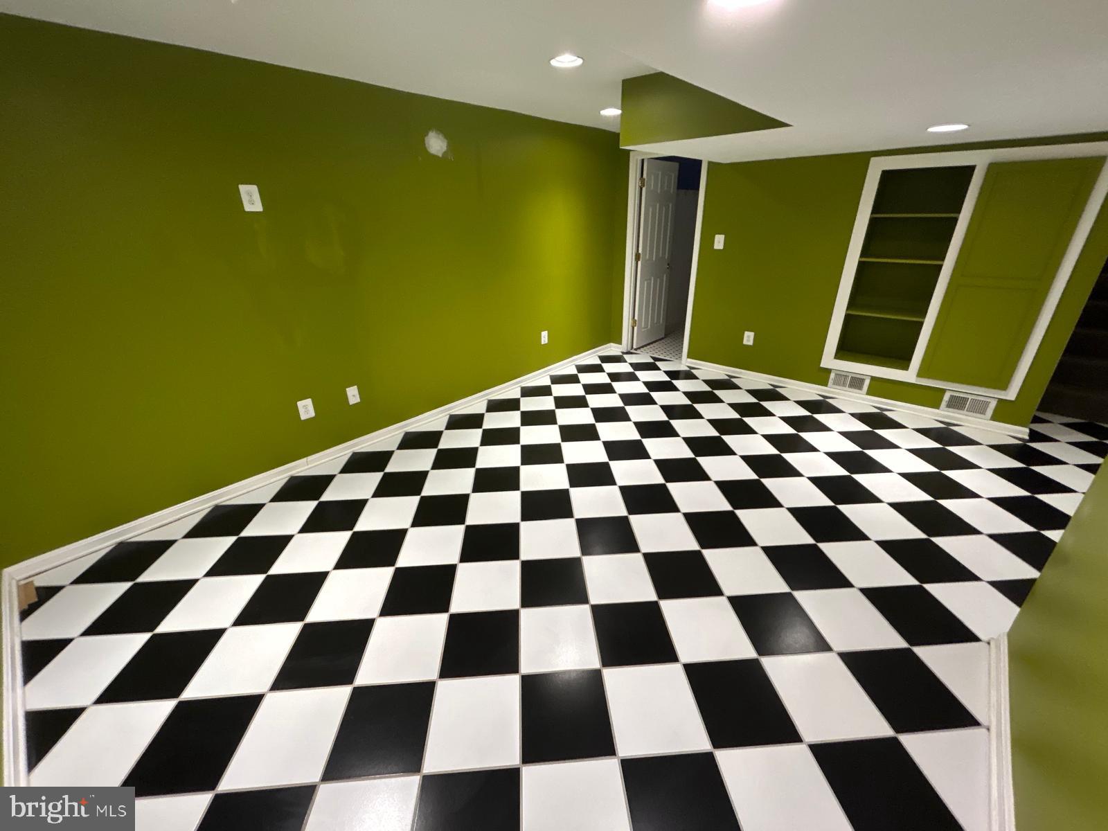 4630 Muncaster Mill Road Rockville, MD 20853 - Photo 30 of 40 a black and white checkered floor