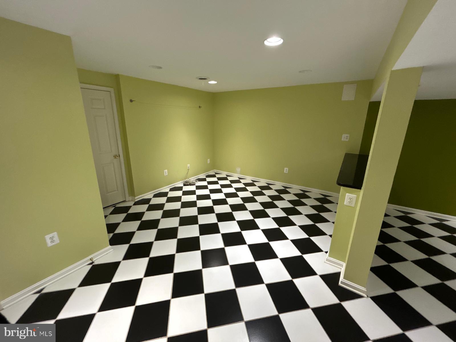 4630 Muncaster Mill Road Rockville, MD 20853 - Photo 31 of 40 a black and white checkered floor
