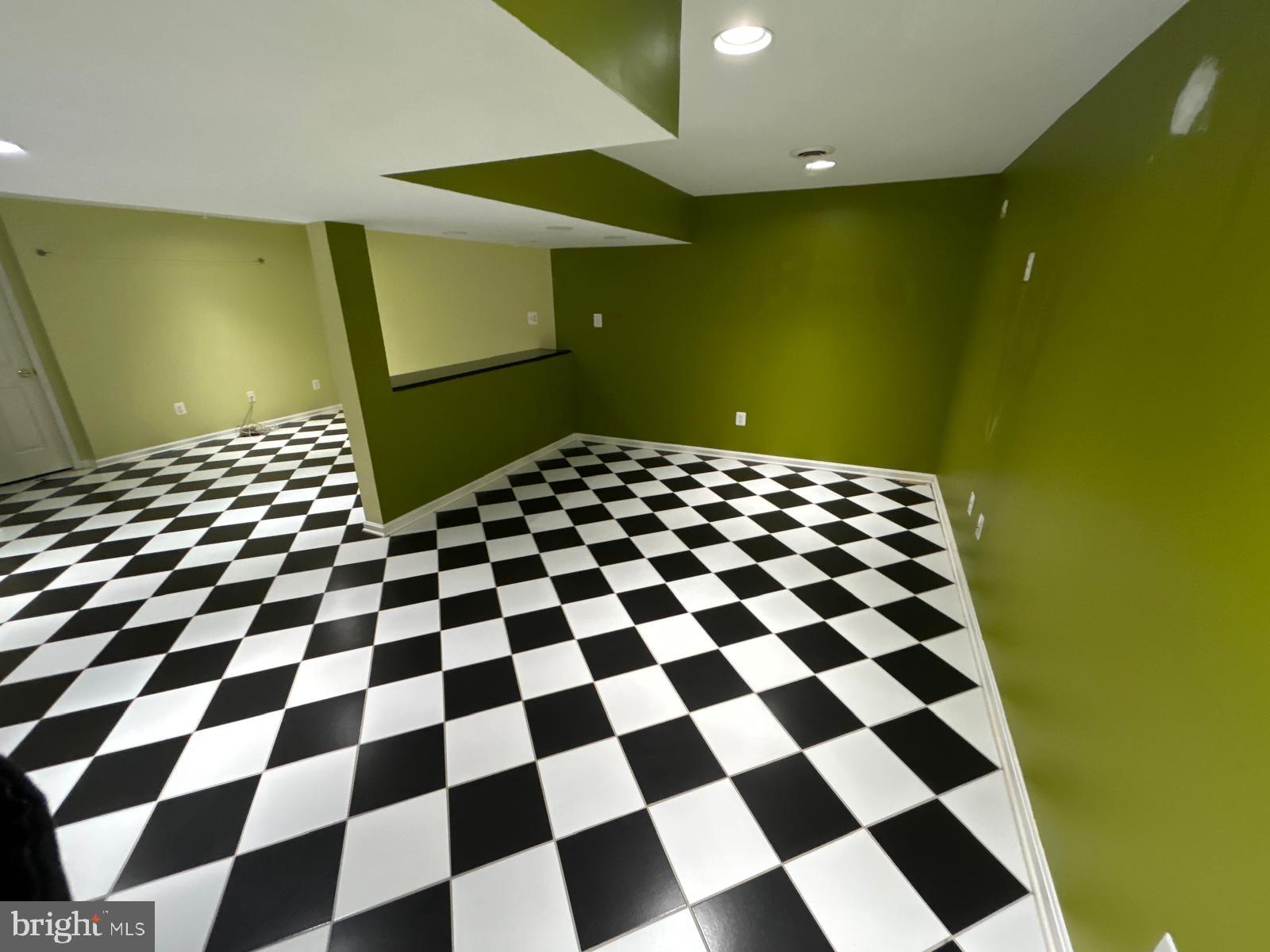 4630 Muncaster Mill Road Rockville, MD 20853 - Photo 32 of 40 a black and white checkered floor