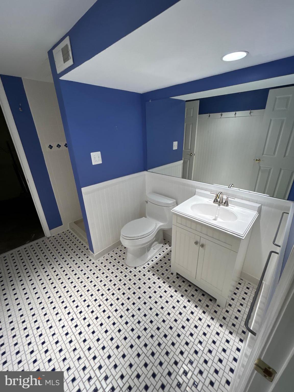 4630 Muncaster Mill Road Rockville, MD 20853 - Photo 33 of 40 a bathroom with a sink toilet and shower