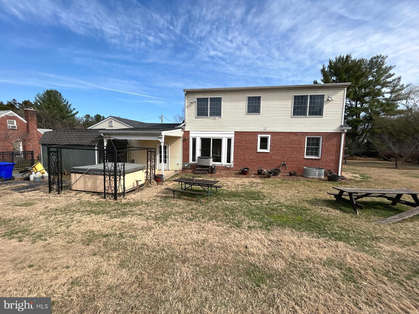 4630 Muncaster Mill Road Rockville, MD 20853 - Photo 38 of 40 a view of a house with backyard and sitting area