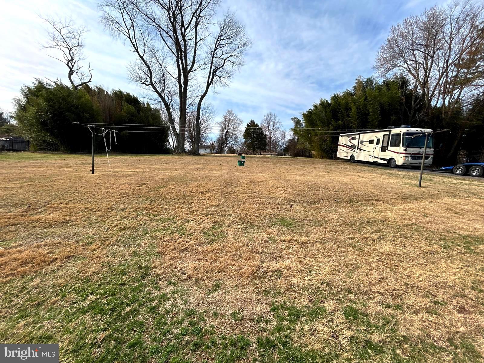 4630 Muncaster Mill Road Rockville, MD 20853 - Photo 39 of 40 a house with trees in front of it