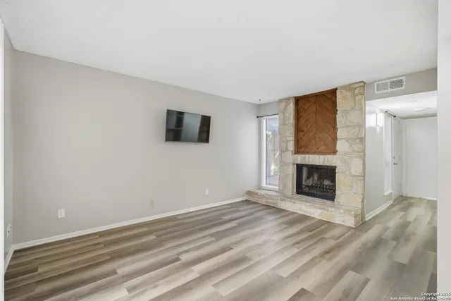 a view of a livingroom with a fireplace