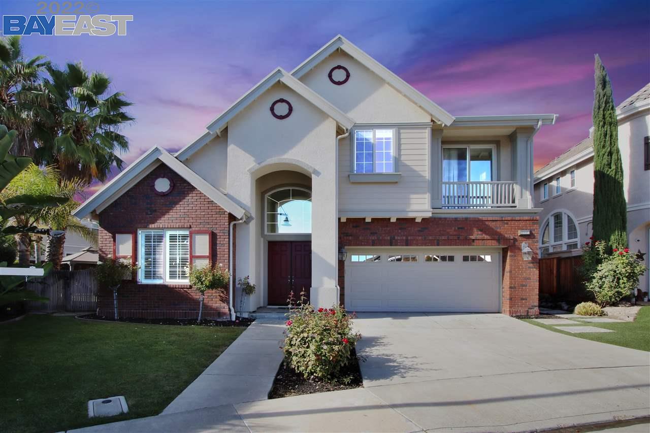 4895 Landmark Way Dublin, CA 94568 - Photo 1 of 1 a front view of a house with a yard and garage