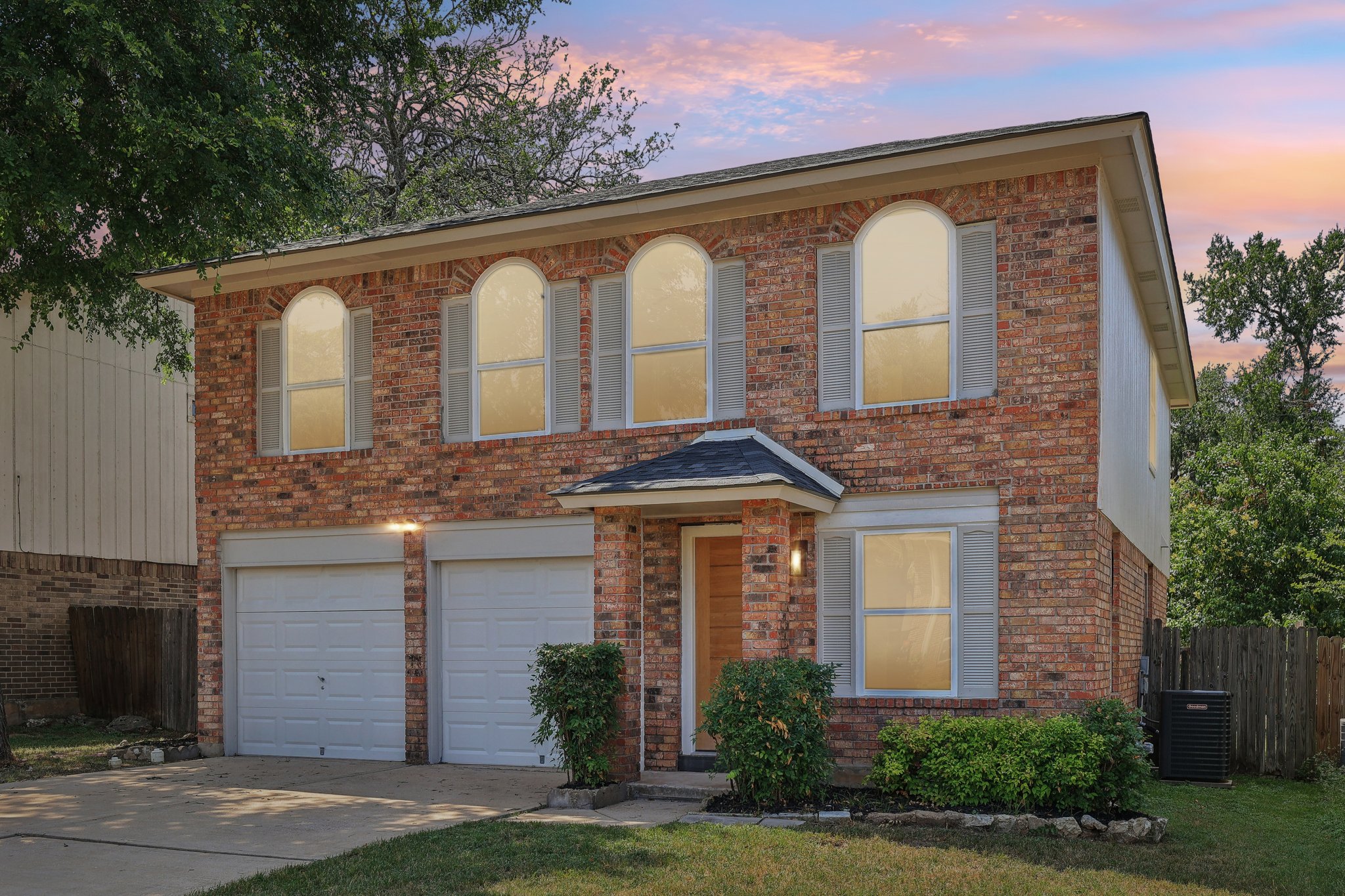 8804 Ravello Pass Austin, TX 78749 - Photo 1 of 1 a front view of a house with garden