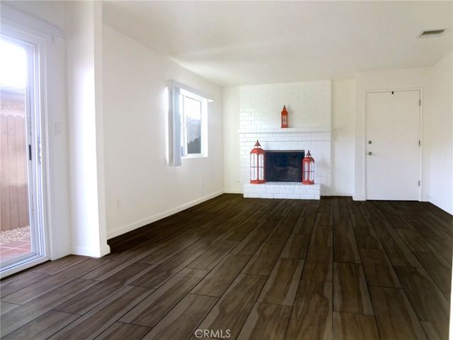 a front view of a house with a fireplace