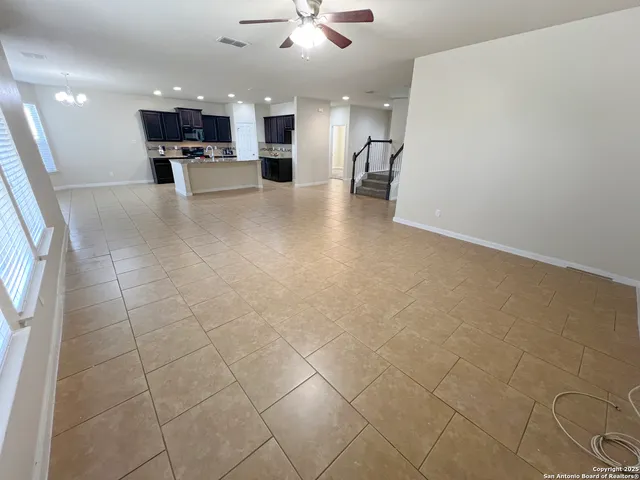 a view of kitchen and kitchen with sink