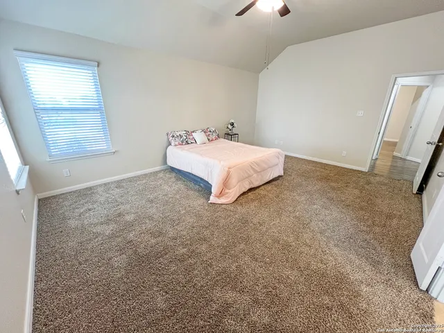 a white bath tub sitting in a bathroom