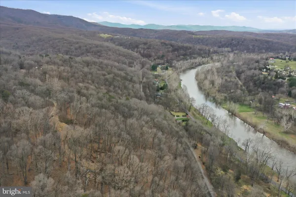 a view of a lake with a mountain in the background