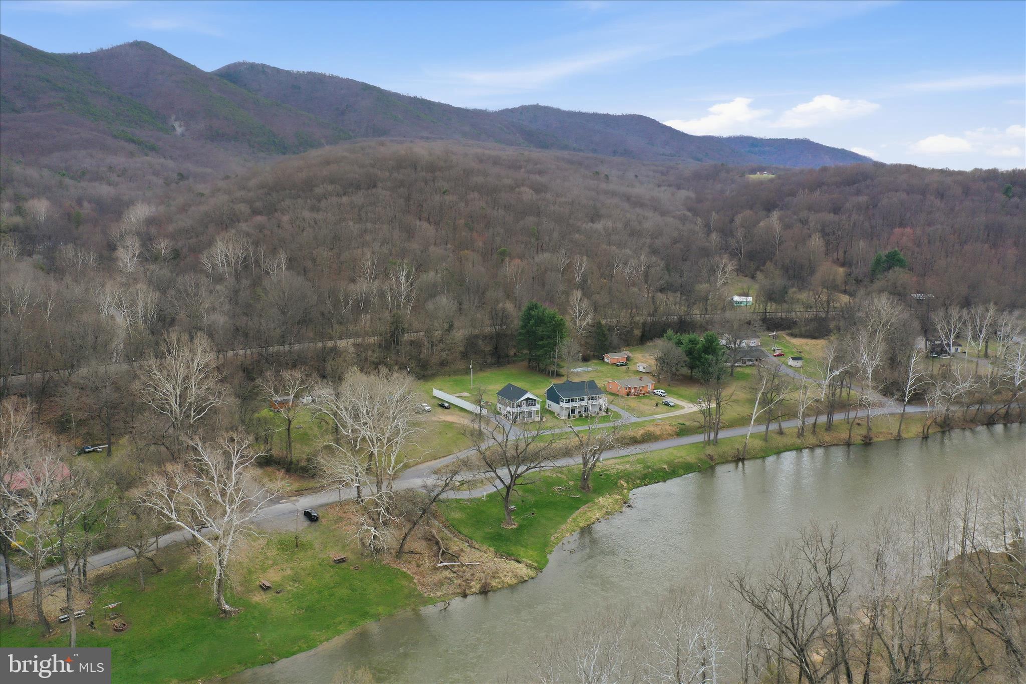 509 River View Place Shenandoah, VA 22849 - Photo 31 of 39 a view of a lake with a mountain in the background