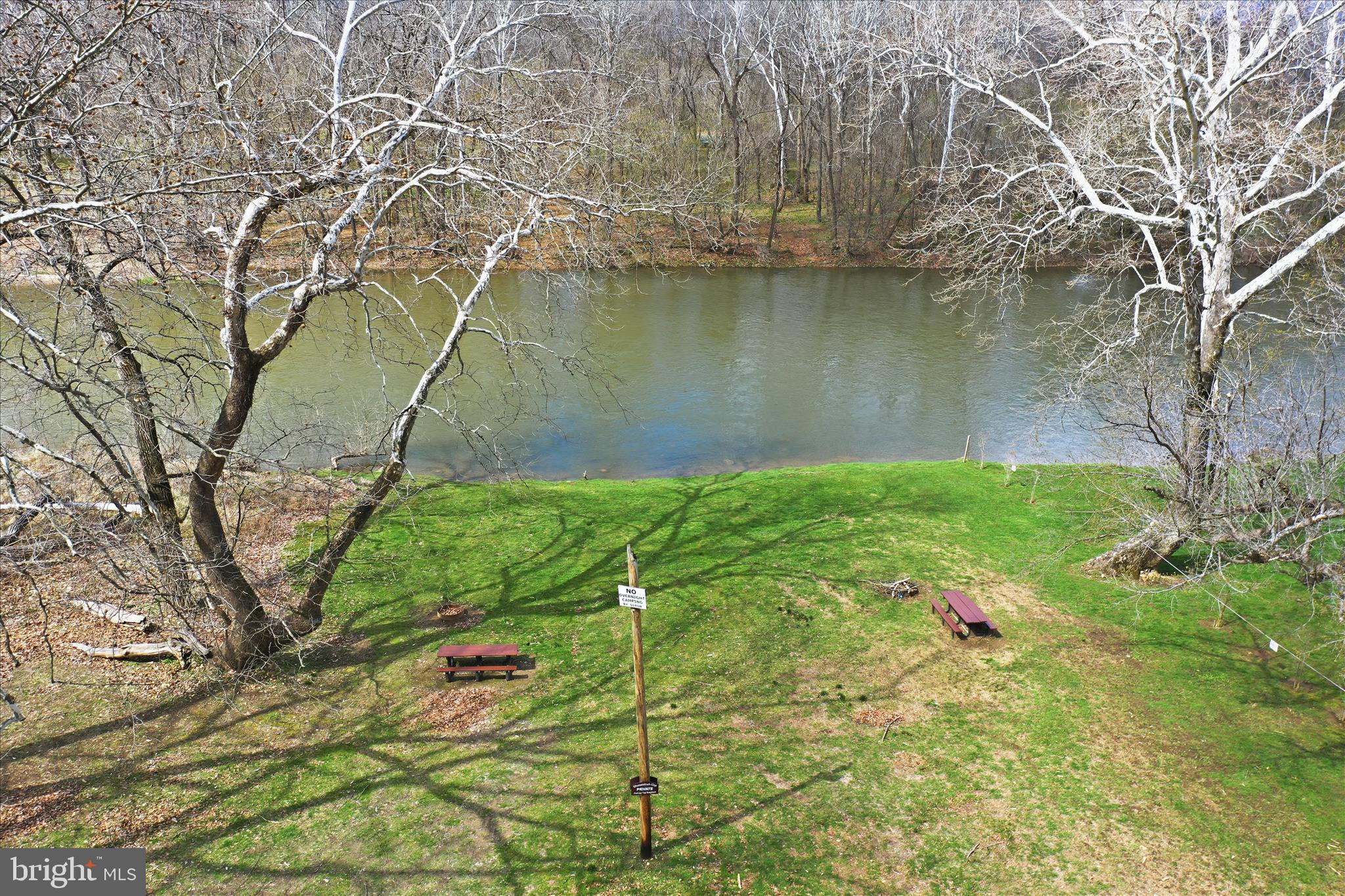 509 River View Place Shenandoah, VA 22849 - Photo 37 of 39 a backyard of a house with lots of green space and lake view
