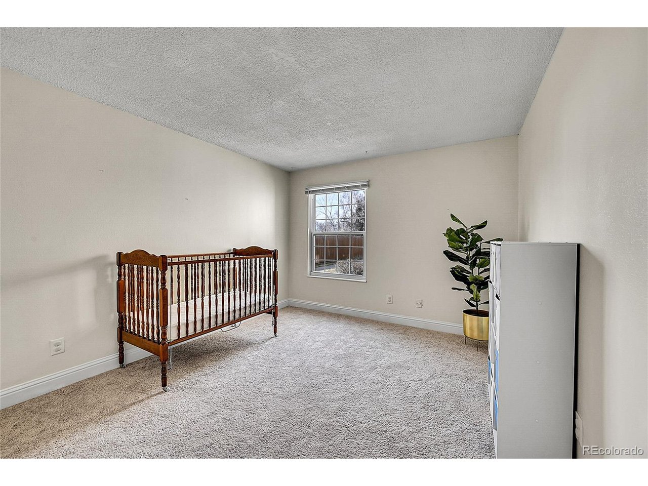 Undisclosed Address Wheat Ridge, CO 80033 - Photo 11 of 21 a view of a livingroom with a staircase