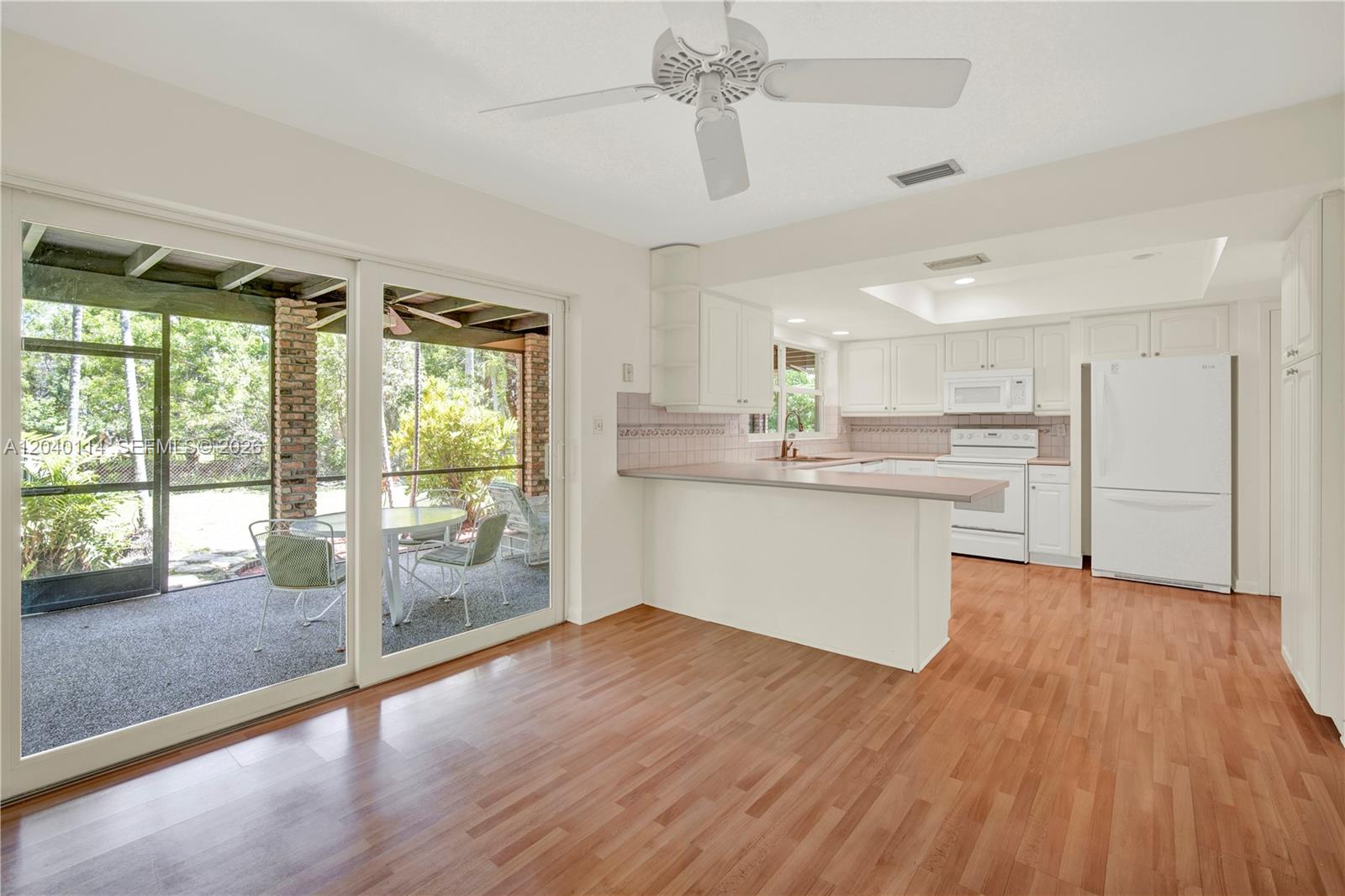 10435 Southwest 96th Street Miami, FL 33176 - Photo 17 of 44 Spacious family room 12.6' x 11.1'