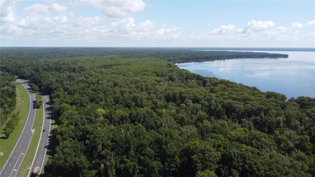 a view of a lake and mountain in back