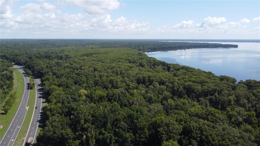 a view of a lake and mountain in back