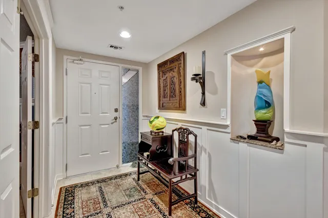 a view of workspace with wooden floor and windows