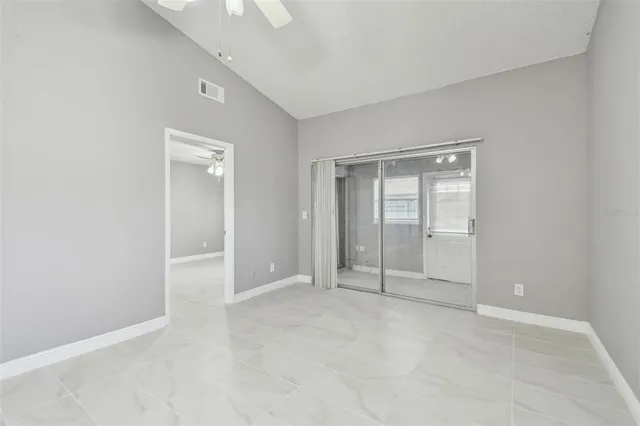 an empty room with sliding door