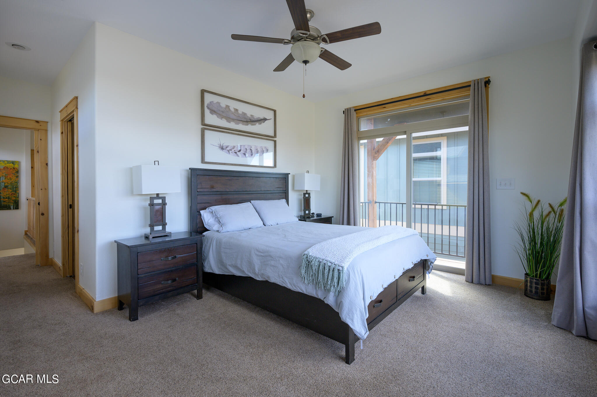 107 Edgewater Circle Granby, CO 80446 - Photo 23 of 51 a bedroom with a bed dresser and a window