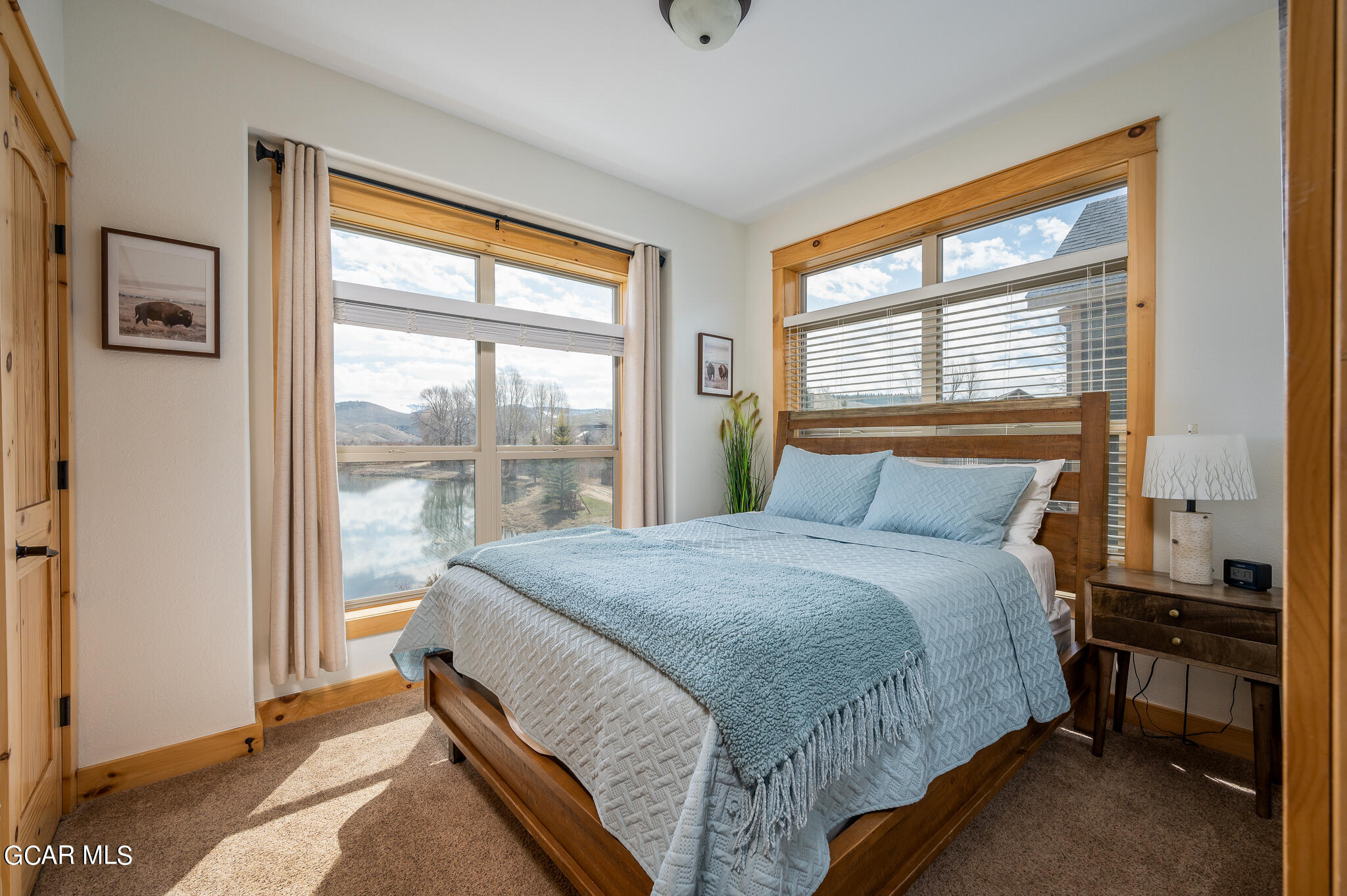 107 Edgewater Circle Granby, CO 80446 - Photo 33 of 51 a bedroom with a bed and a window
