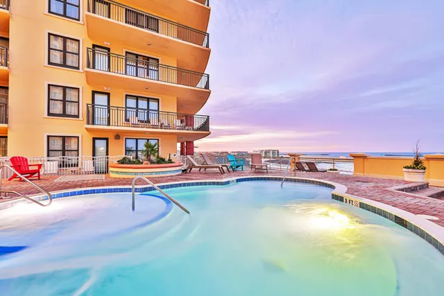 a view of a balcony with an ocean view