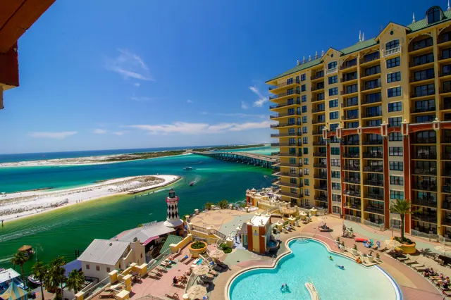 a view of a swimming pool and lounge chairs