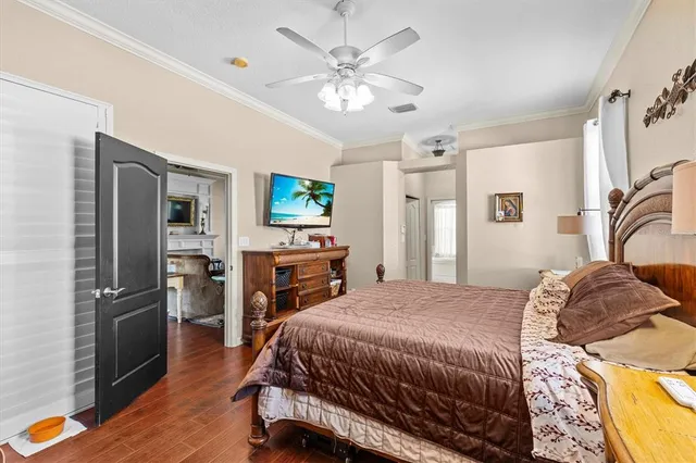 a bathroom with a double vanity sink a mirror and a bathtub