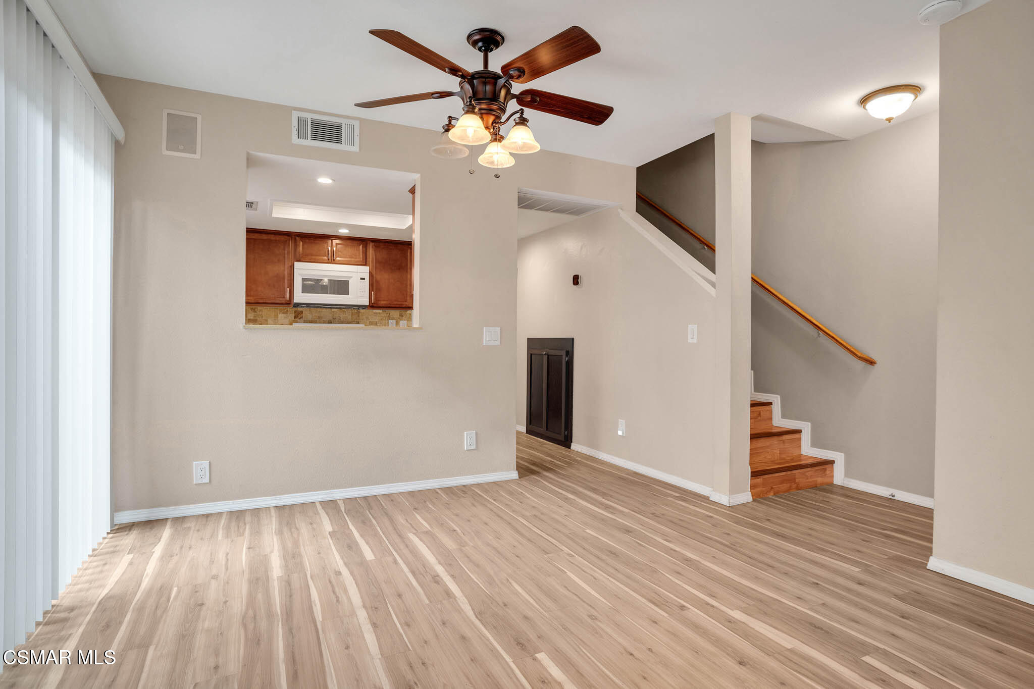 4492 Apricot Road, Unit B Simi Valley, CA 93063 - Photo 11 of 28 wooden floor in an empty room with a window