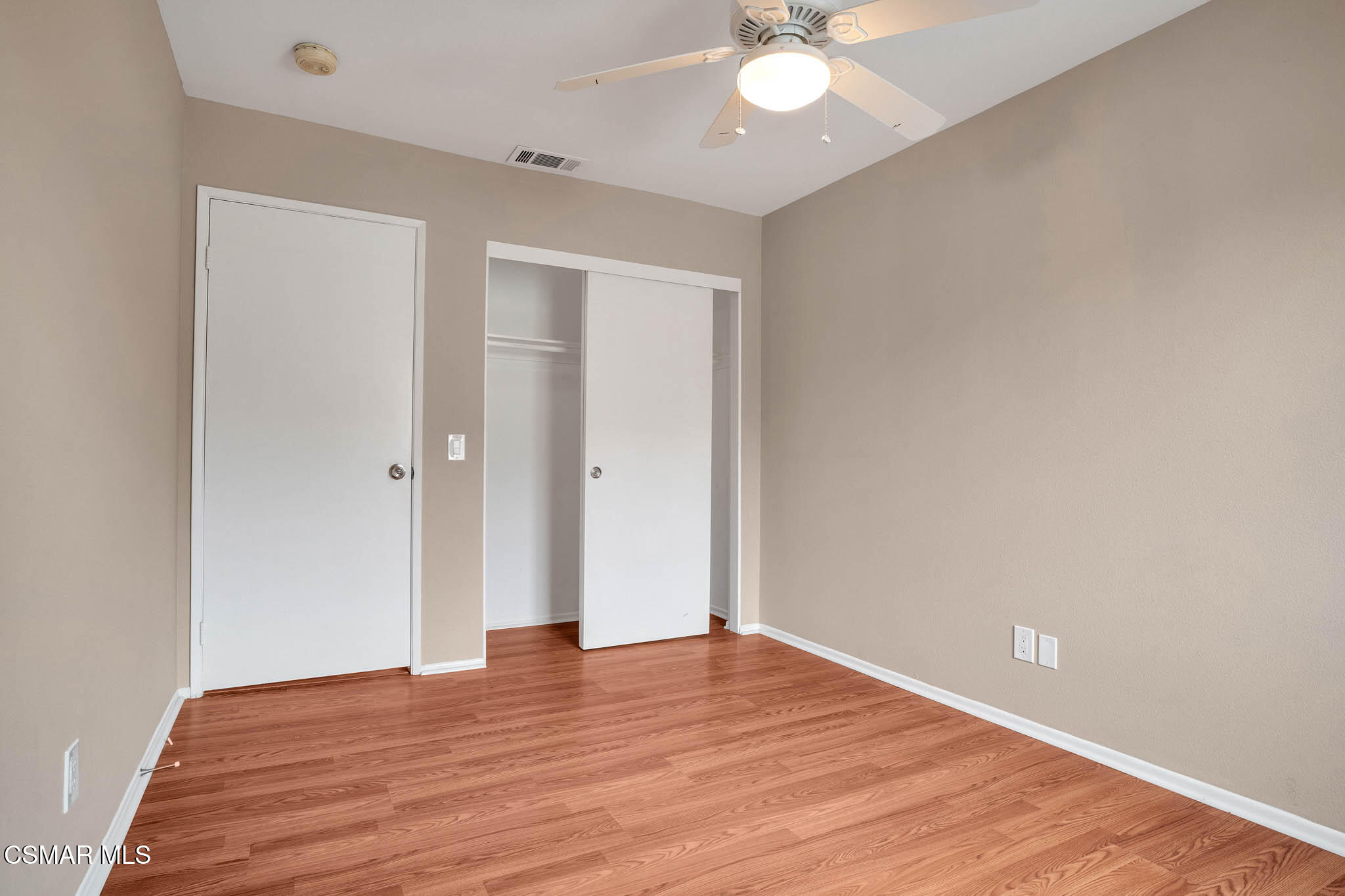 4492 Apricot Road, Unit B Simi Valley, CA 93063 - Photo 17 of 28 a view of an empty room with wooden floor