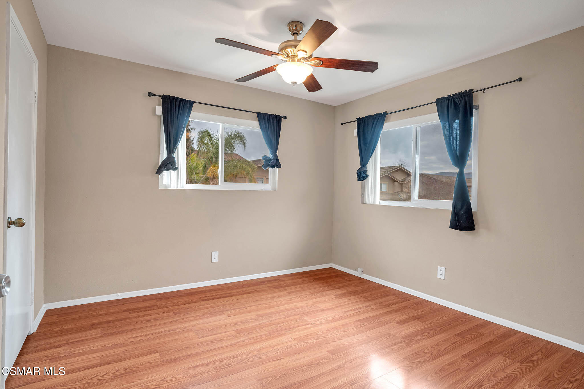 4492 Apricot Road, Unit B Simi Valley, CA 93063 - Photo 20 of 28 a view of an empty room with window and wooden floor
