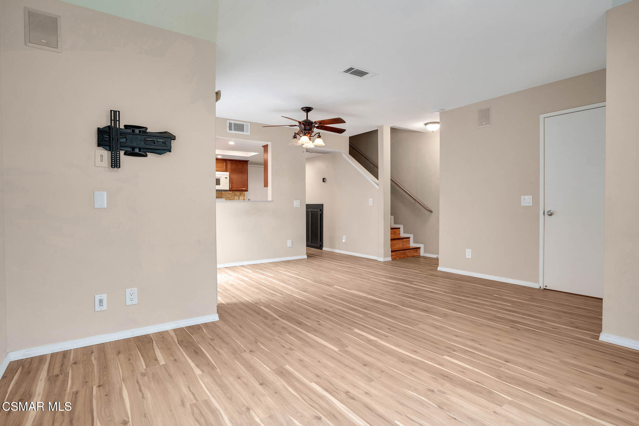 4492 Apricot Road, Unit B Simi Valley, CA 93063 - Photo 7 of 28 wooden floor in an empty room with a window
