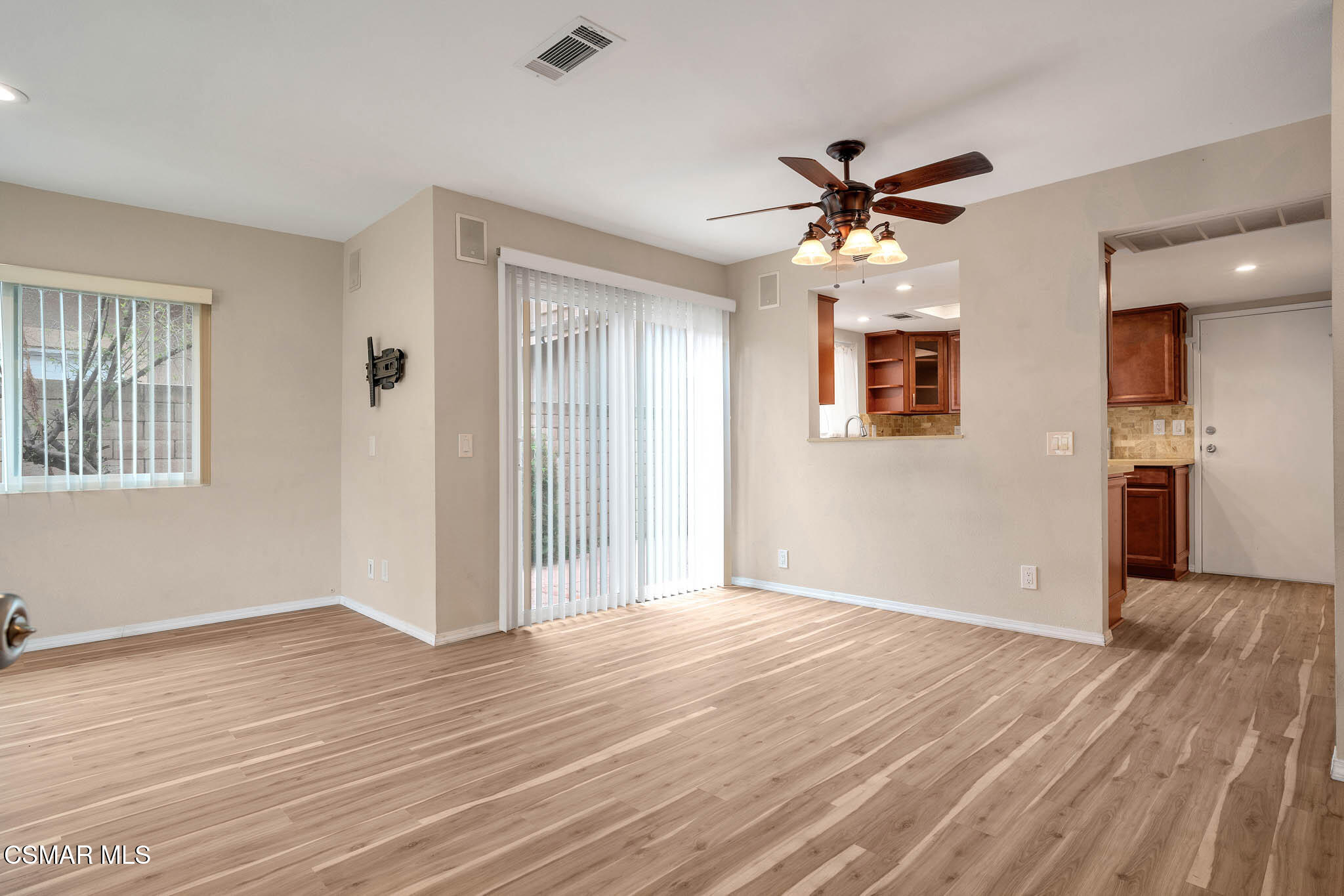 4492 Apricot Road, Unit B Simi Valley, CA 93063 - Photo 9 of 28 a view of an empty room with window and wooden floor