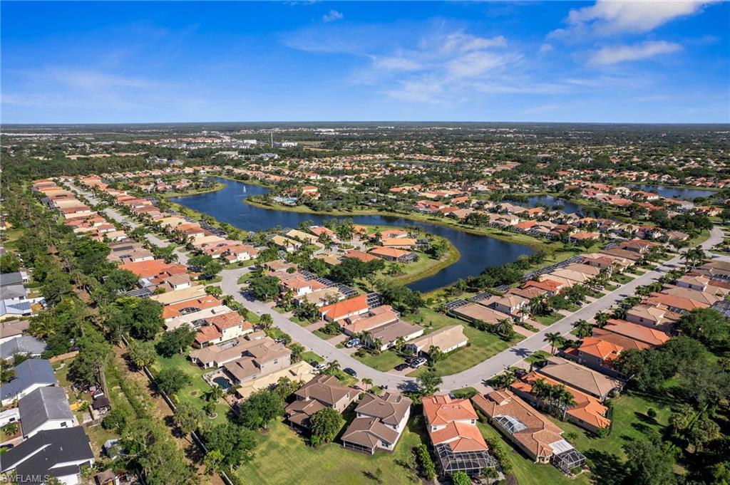 9079 Astonia Way Estero, FL 33967 - Photo 33 of 37 an aerial view of residential houses with outdoor space