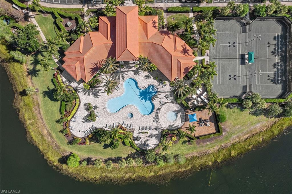 9079 Astonia Way Estero, FL 33967 - Photo 34 of 37 an aerial view of a house with a garden and lake view