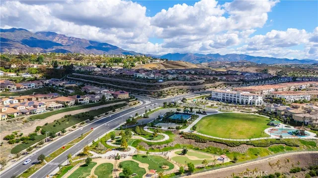 a view of a swimming pool with a table and chairs