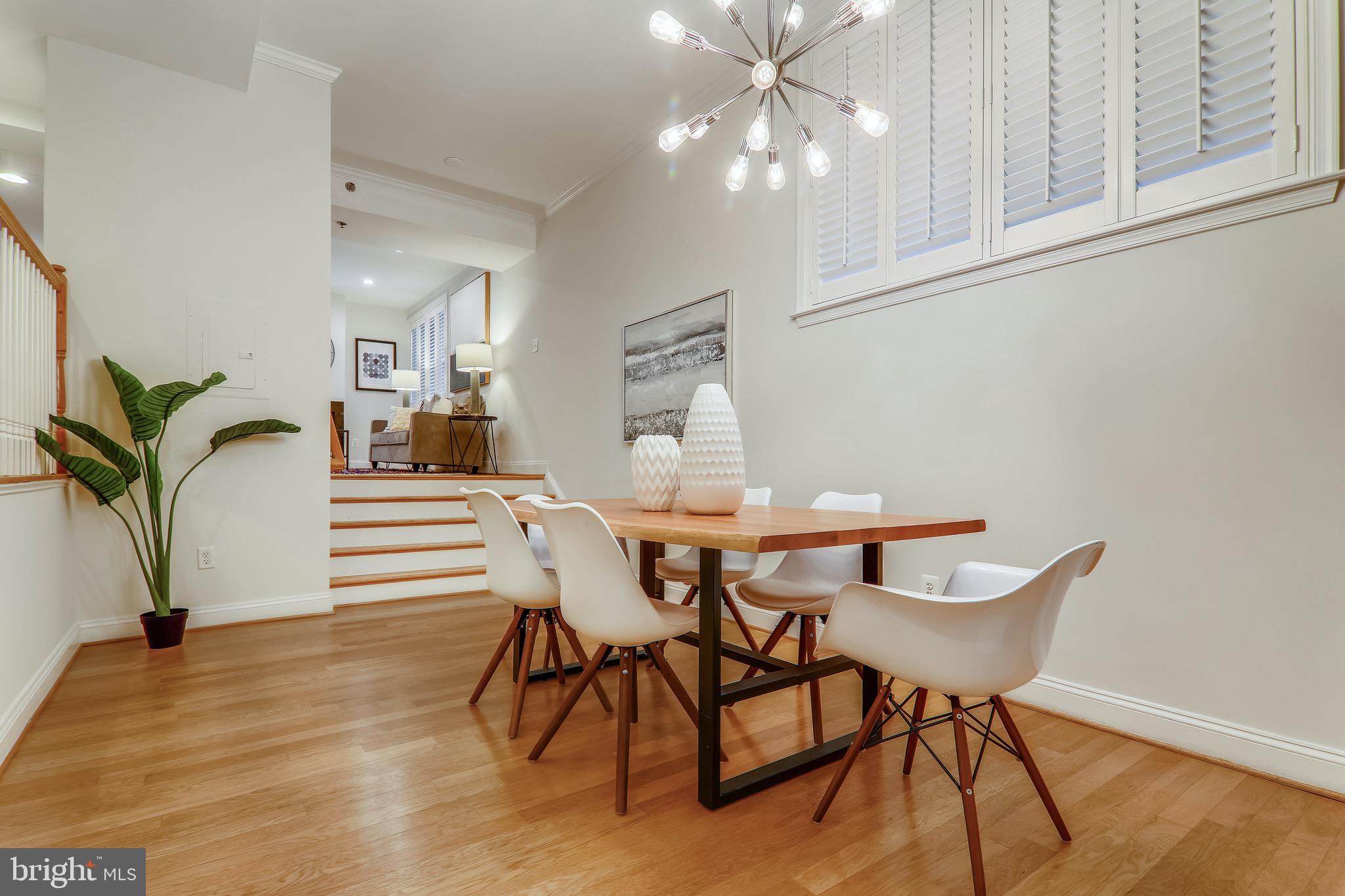 1438 Columbia Road Northwest, Unit 103 Washington, DC 20009 - Photo 11 of 39 Large dining room open to kitchen & living room