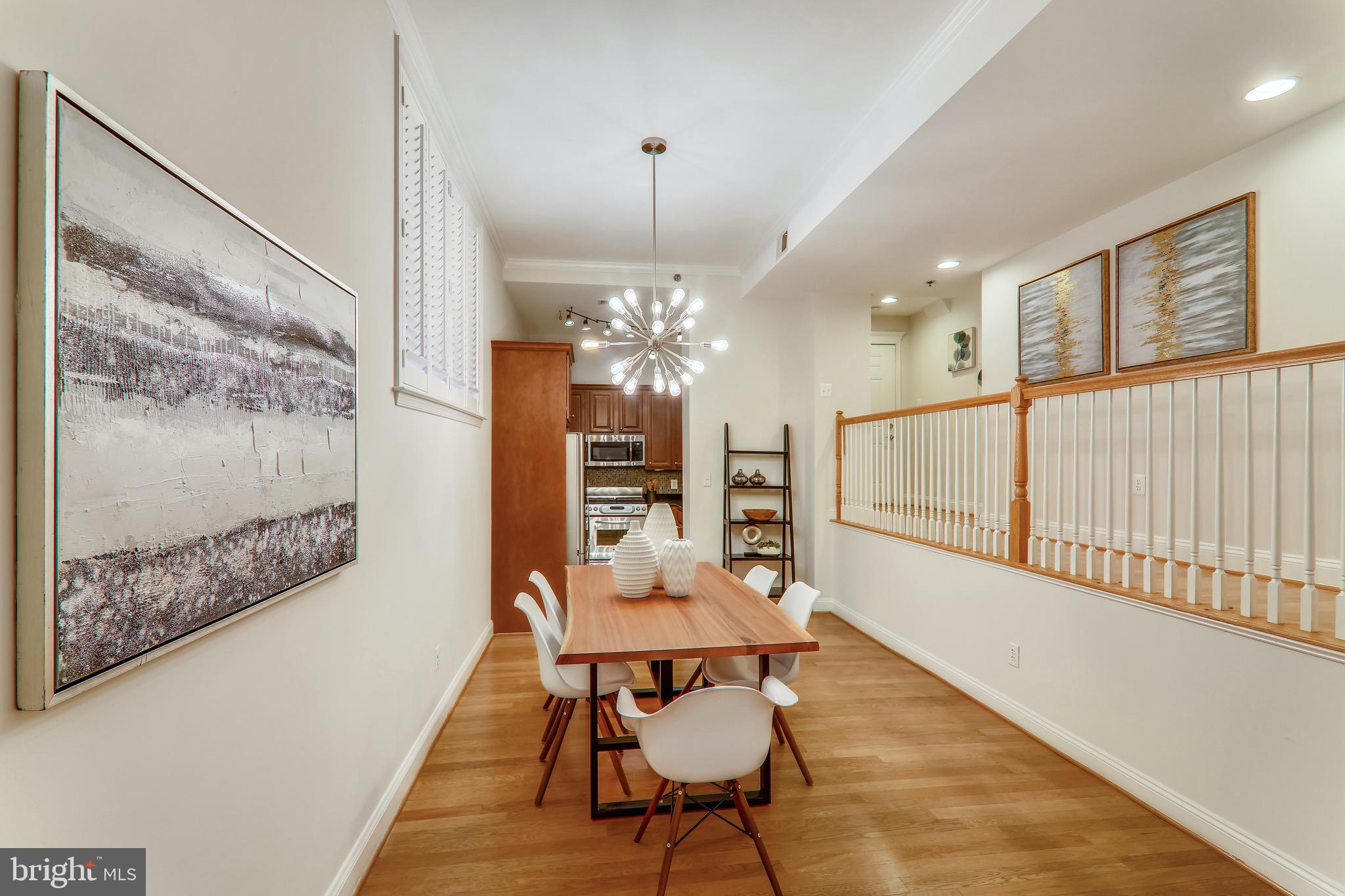 1438 Columbia Road Northwest, Unit 103 Washington, DC 20009 - Photo 12 of 39 View of dining room to kitchen/open foyer